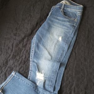 Distressed denim jeans